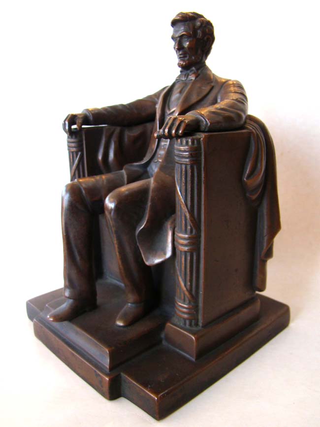 A single "Lincoln sitting in the chair" bookend by Jennings Brothers circa 1925
